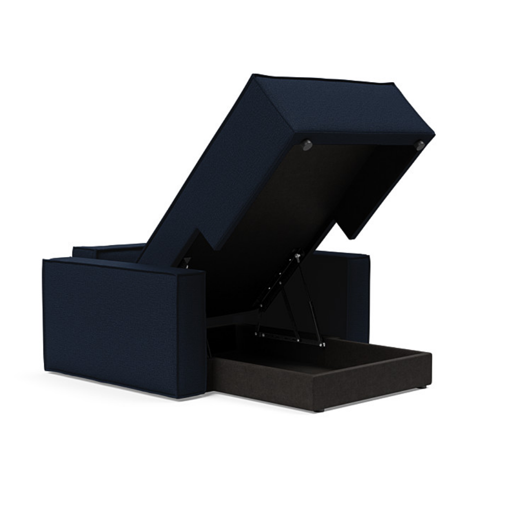 The Newilla Lounger Chair with Standard Arms from Innovation Living with mixed dance blue 528 upholstery open and showing the internal storage.