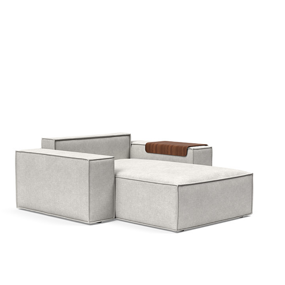 The Newilla Lounger Chair with Wide Arms from Innovation Living with adario fog 256 upholstery without the cushion, setup as a bed.