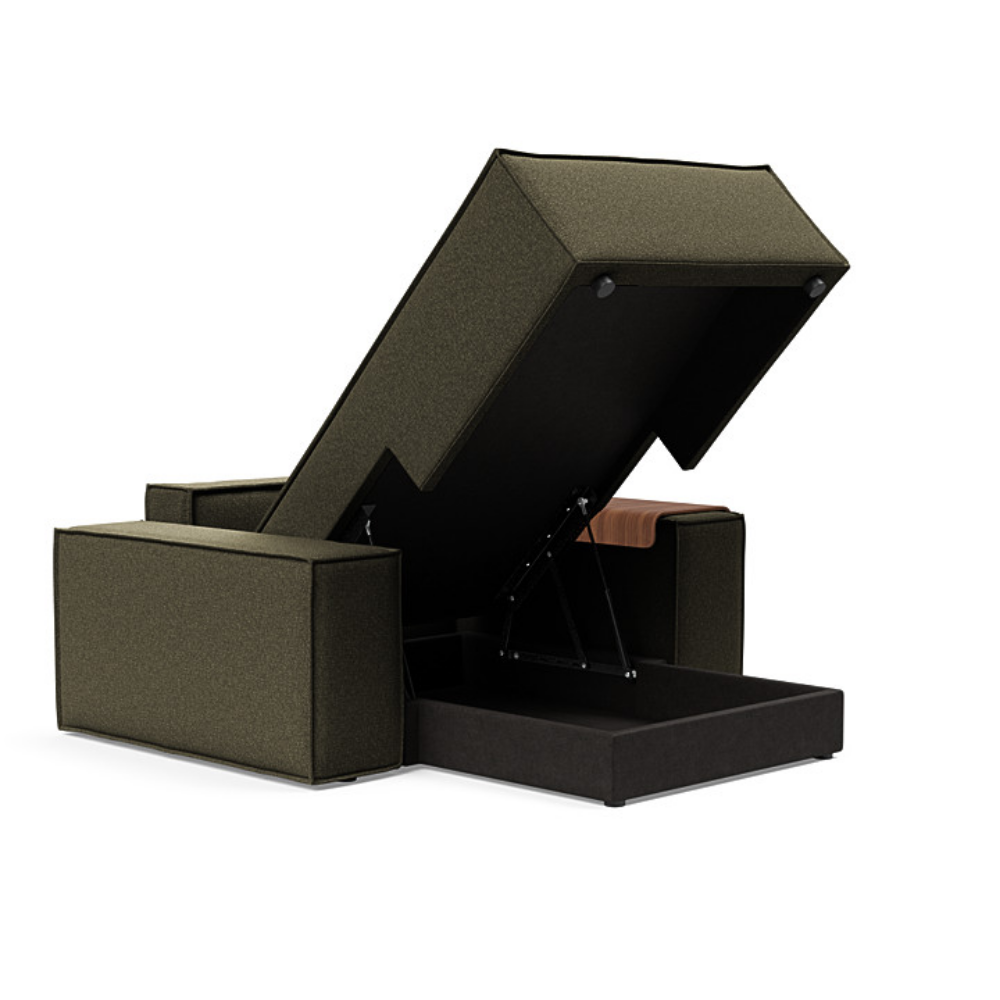 The Newilla Lounger Chair with Wide Arms from Innovation Living with boucle forest green 535 upholstery open showing the internal storage.