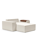 The Newilla Lounger Chair with Wide Arms from Innovation Living with boucle off white 531 upholstery without the cushion, setup as a bed.