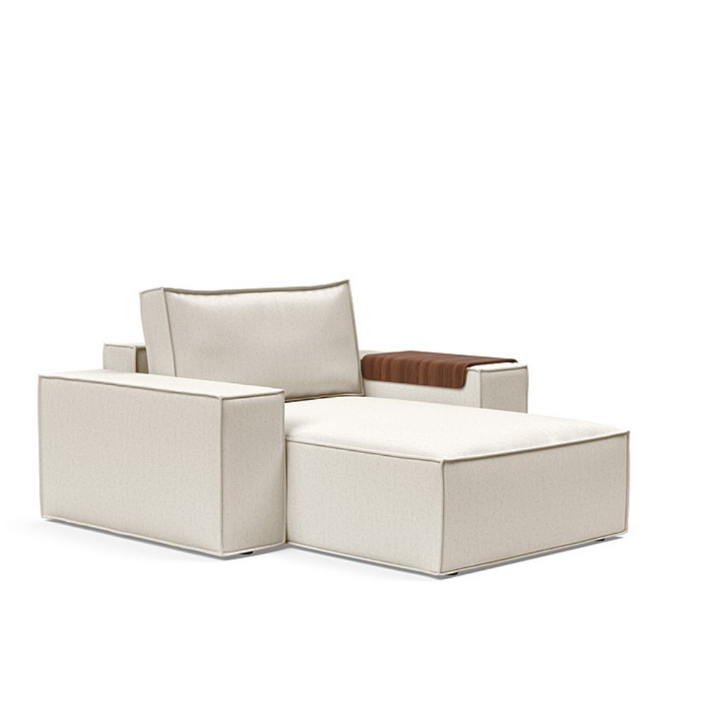 The Newilla Lounger Chair with Wide Arms from Innovation Living with boucle off white 531 upholstery setup as a lounge chair.
