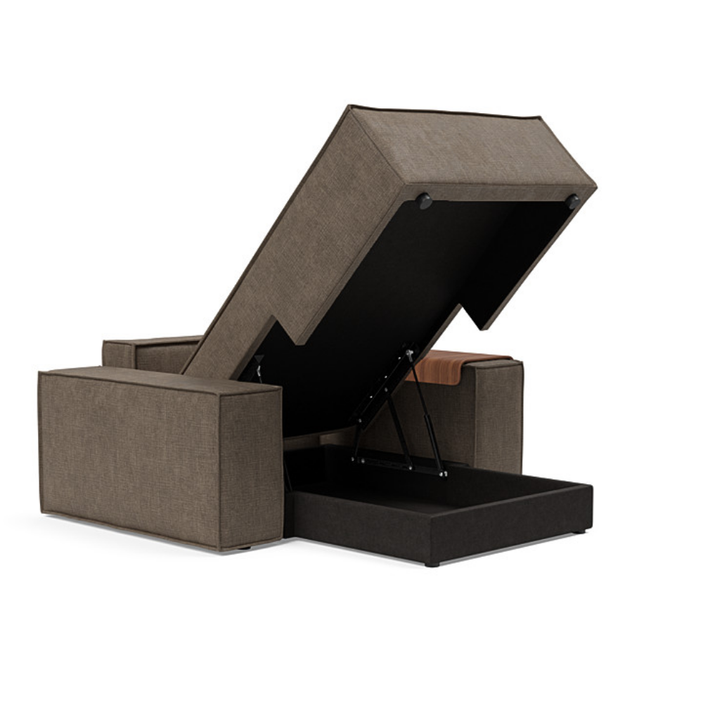 The Newilla Lounger Chair with Wide Arms from Innovation Living with esina cedar brown 411 upholstery open and showing the internal storage.