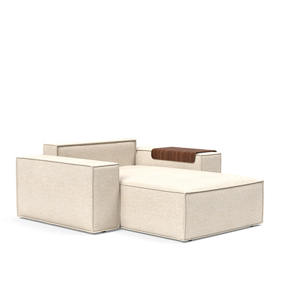 The Newilla Lounger Chair with Wide Arms from Innovation Living with halifax shell 365 upholstery without the cushion, setup as a bed.