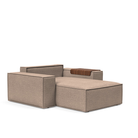 The Newilla Lounger Chair with Wide Arms from Innovation Living with halifax wicker 367 upholstery without the cushion, setup as a bed.