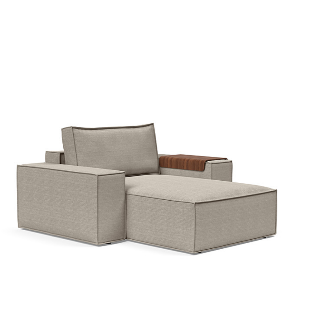 The Newilla Lounger Chair with Wide Arms from Innovation Living with kenya gravel 579 upholstery setup as a lounge chair.