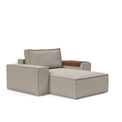 The Newilla Lounger Chair with Wide Arms from Innovation Living with kenya gravel 579 upholstery setup as a lounge chair.