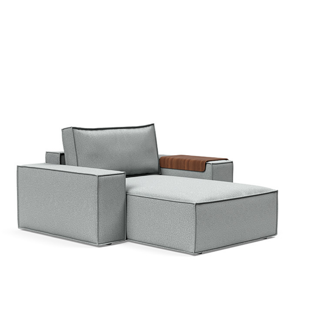 The Newilla Lounger Chair with Wide Arms from Innovation Living with melange light grey 538 upholstery setup as a lounge chair.