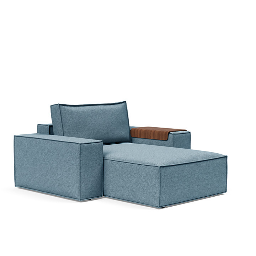 The Newilla Lounger Chair with Wide Arms from Innovation Living with mixed dance light blue 525 upholstery setup as a lounge chair.