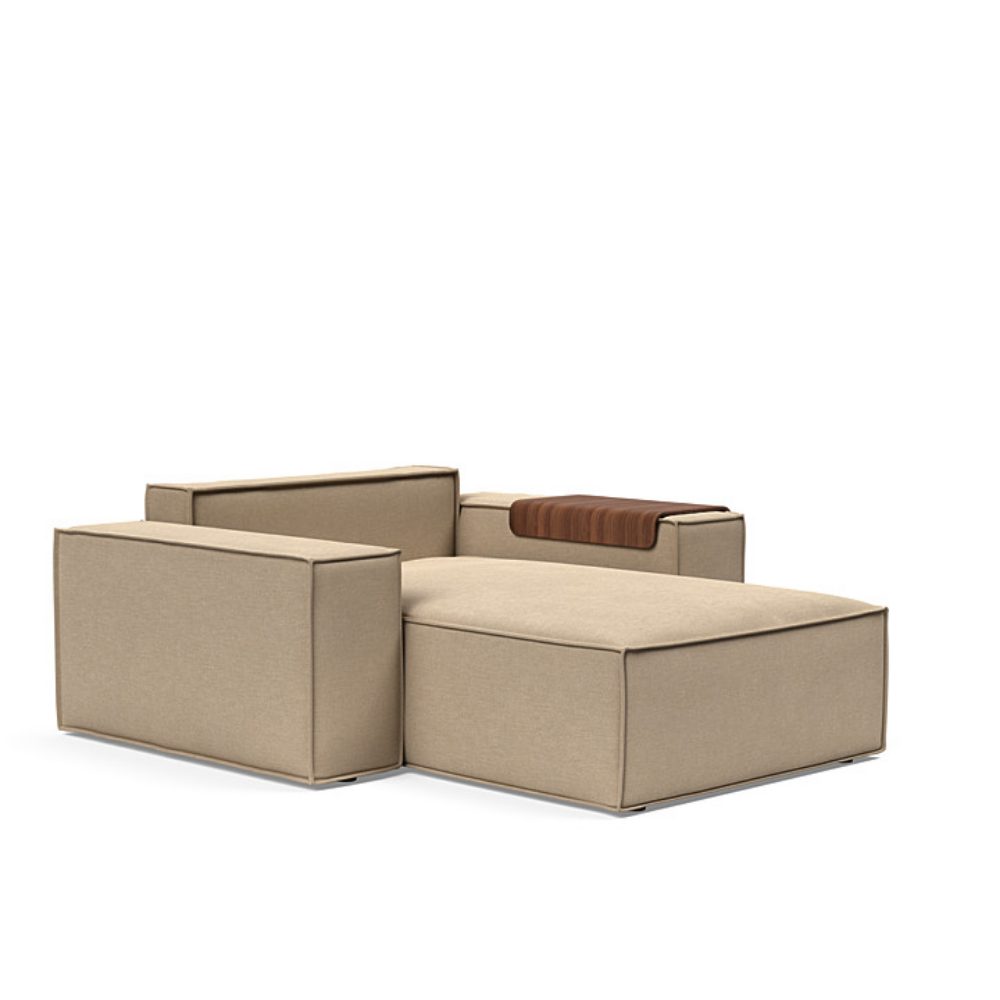 The Newilla Lounger Chair with Wide Arms from Innovation Living with phobos mocha 587 upholstery without the cushion, setup as a bed.