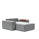 The Newilla Lounger Chair with Wide Arms from Innovation Living with taura slate grey 351 upholstery without the cushion, setup as a bed.