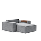 The Newilla Lounger Chair with Wide Arms from Innovation Living with twist granite 565 upholstery without the cushion, setup as a bed.