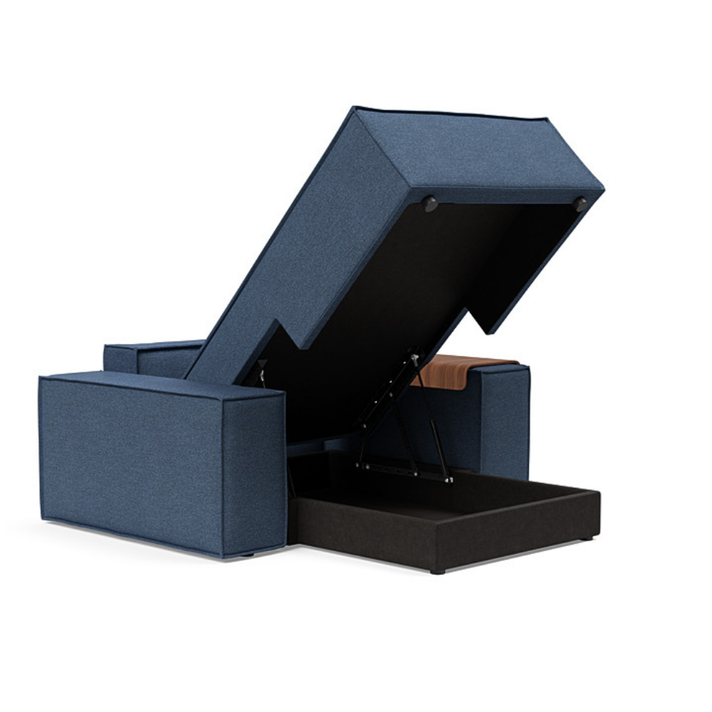 The Newilla Lounger Chair with Wide Arms from Innovation Living with weda blue 302 upholstery open showing the internal storage.