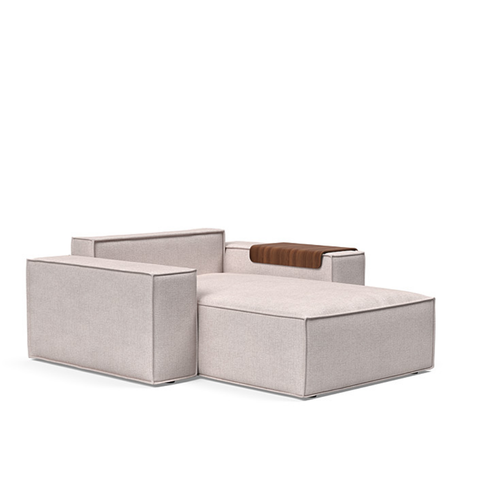 The Newilla Lounger Chair with Wide Arms from Innovation Living with weda sand 300 upholstery without the cushion, setup as a bed.