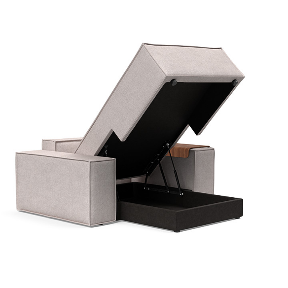 The Newilla Lounger Chair with Wide Arms from Innovation Living with weda sand 300 upholstery open showing the internal storage.