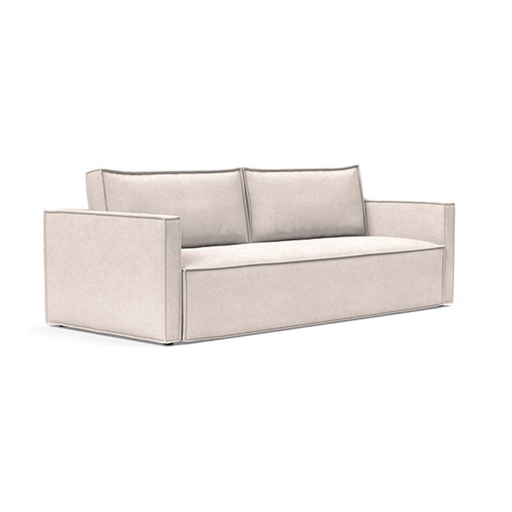 The Newilla Sleeper Sofa from Innovation Living with slim arms and adario basmati 255 upholstery setup as a sofa.