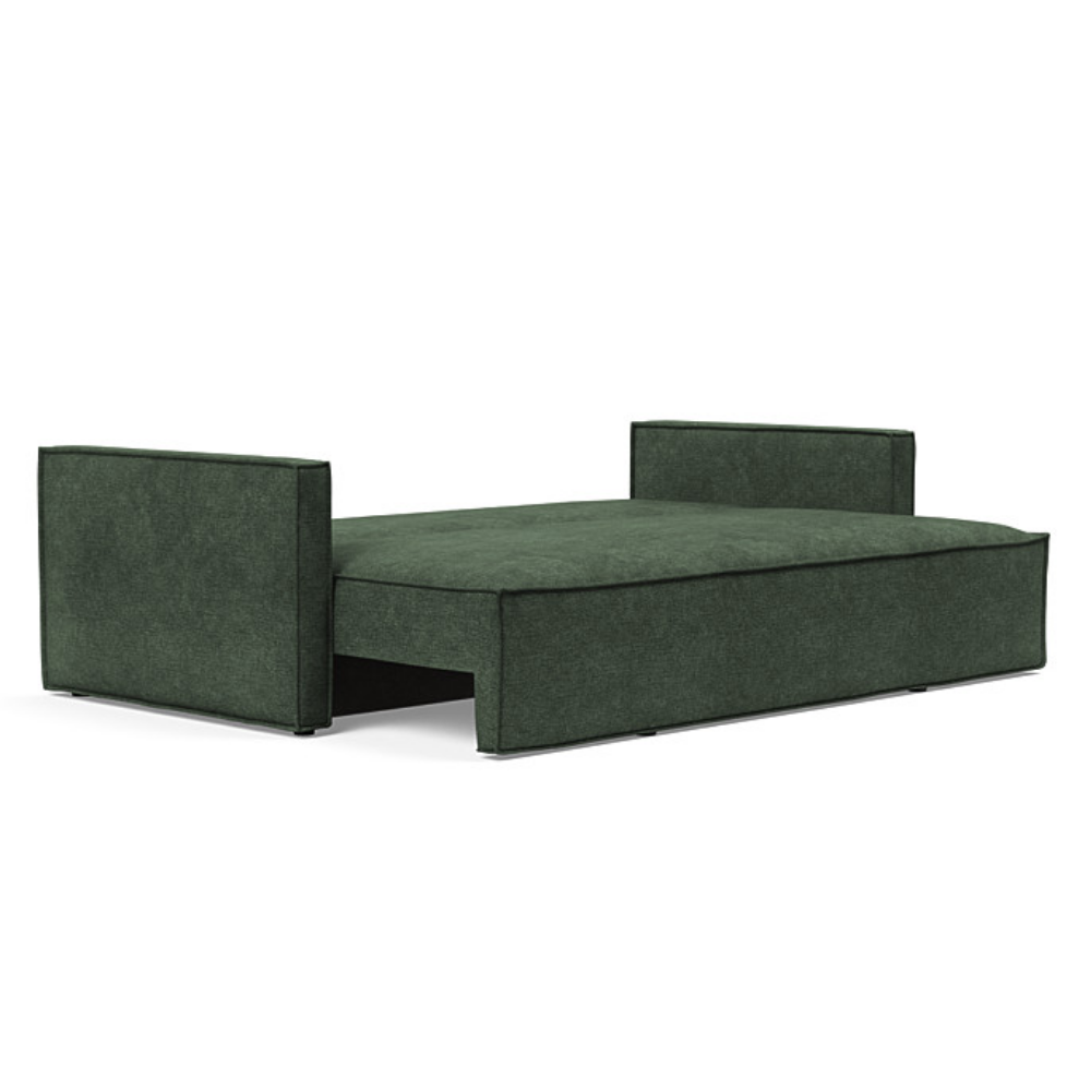 The Newilla Sleeper Sofa from Innovation Living with slim arms and avella pine green 281 upholstery setup as a bed.