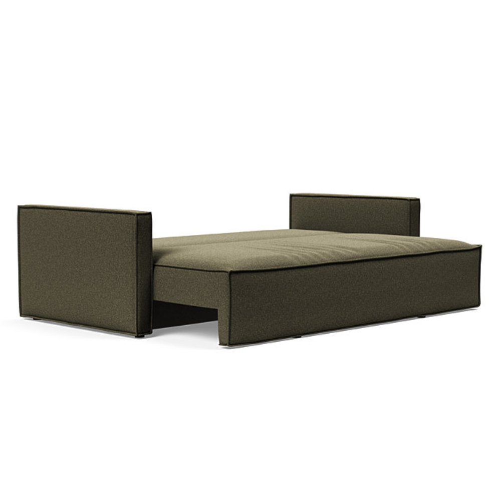 The Newilla Sleeper Sofa from Innovation Living with slim arms and boucle forest green 535 upholstery setup as a bed.