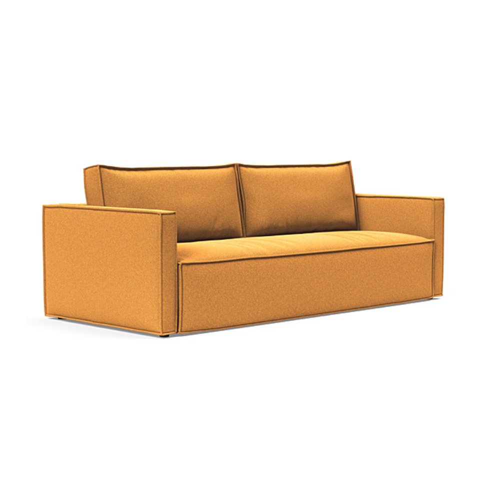 The Newilla Sleeper Sofa from Innovation Living with slim arms and boucle ochre 536 upholstery setup as a sofa.