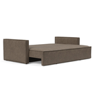 The Newilla Sleeper Sofa from Innovation Living with slim arms and esina cedar brown 411 upholstery setup as a bed.