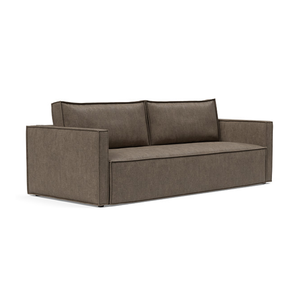 The Newilla Sleeper Sofa from Innovation Living with slim arms and esina cedar brown 411 upholstery setup as a sofa.