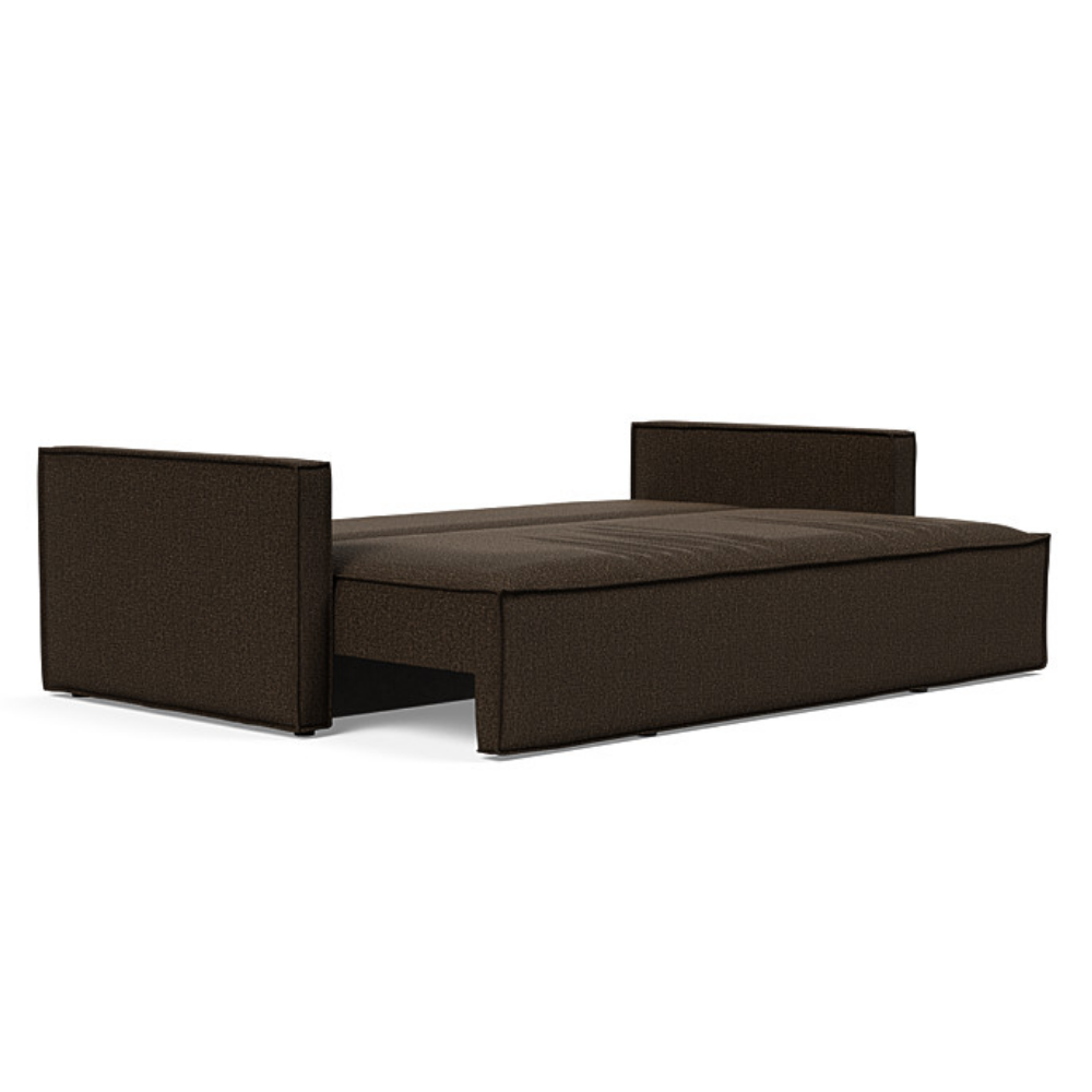 The Newilla Sleeper Sofa from Innovation Living with slim arms and taura chocco 358 upholstery setup as a bed.