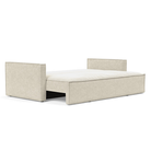 The Newilla Sleeper Sofa from Innovation Living with slim arms and taura off white 357 upholstery setup as a bed.
