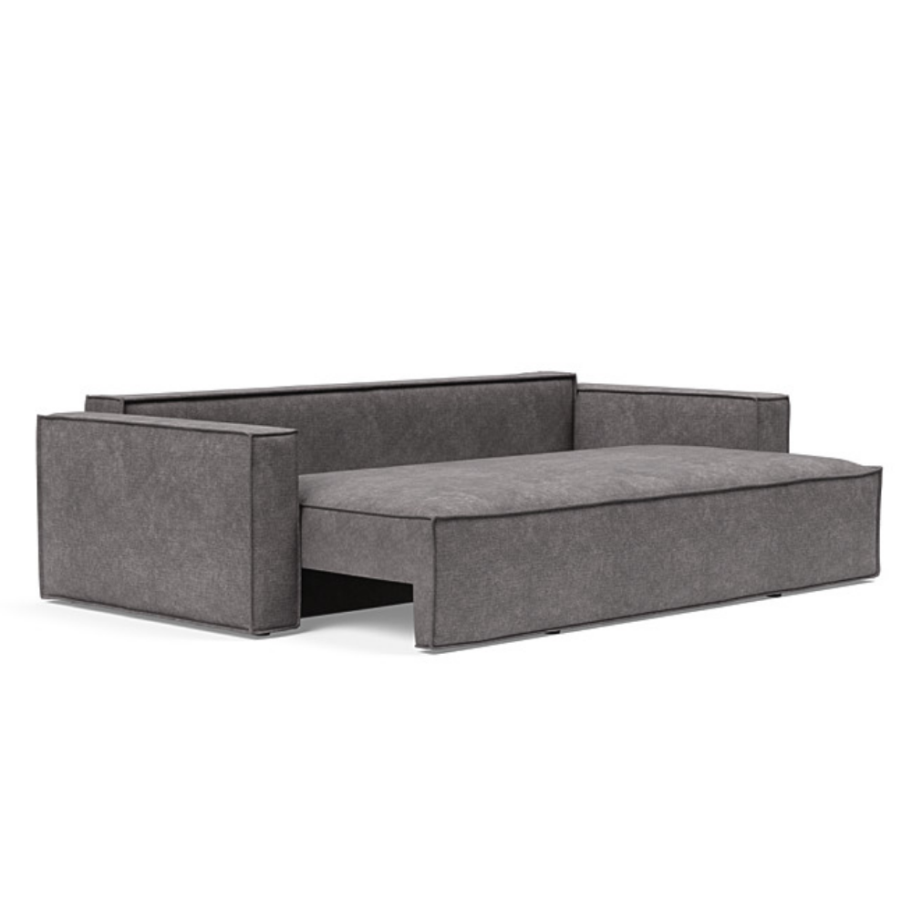 The Newilla Sleeper Sofa from Innovation Living with standard arms and avella warm grey 282 upholstery setup as a bed.