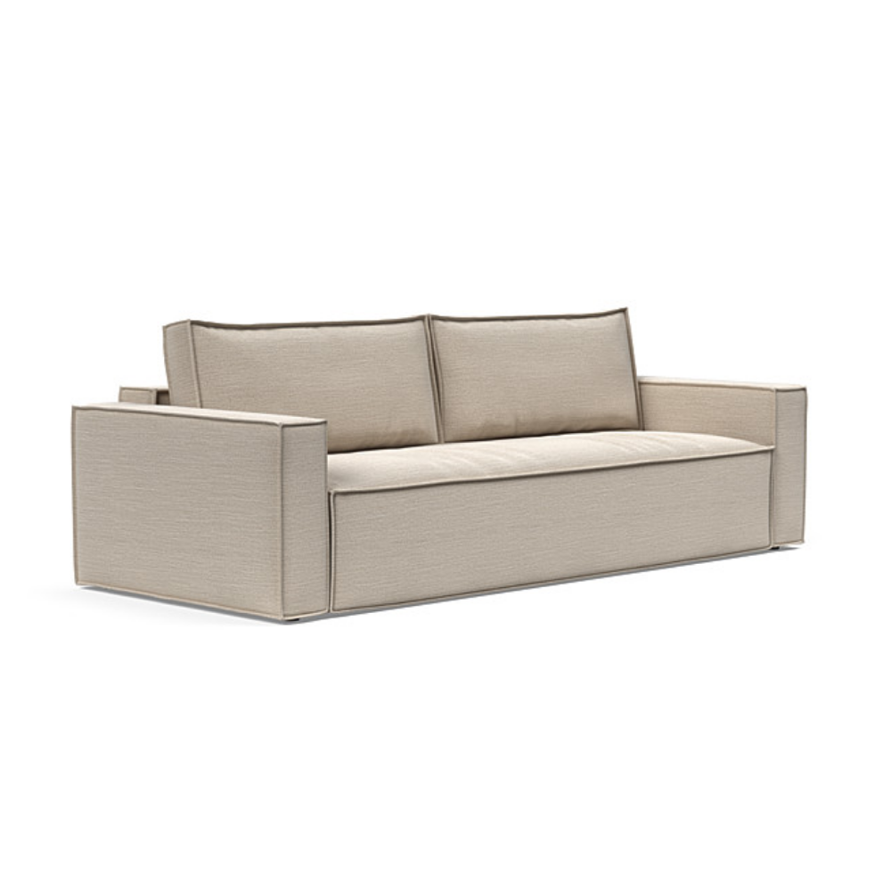 The Newilla Sleeper Sofa from Innovation Living with standard arms and blida sand grey 612 upholstery setup as a sofa.