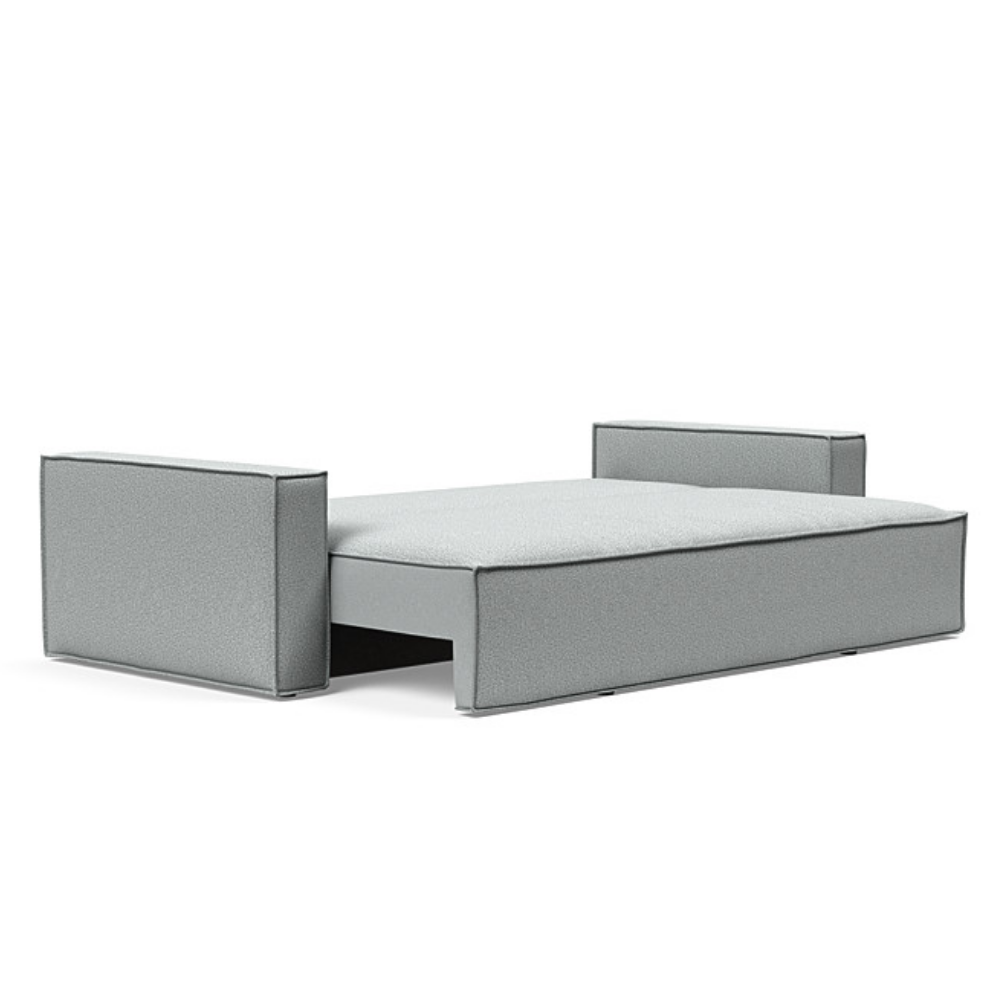 The Newilla Sleeper Sofa from Innovation Living with standard arms and melange light grey 538 upholstery setup as a bed.