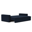 The Newilla Sleeper Sofa from Innovation Living with wide arms and mixed dance blue 528 upholstery setup as a bed.