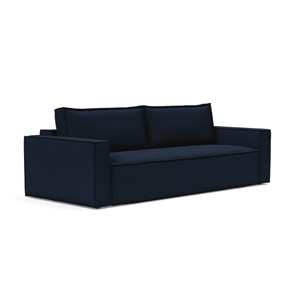 The Newilla Sleeper Sofa from Innovation Living with wide arms and mixed dance blue 528 upholstery setup as a sofa.