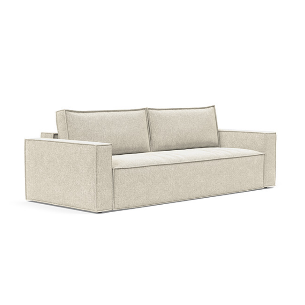The Newilla Sleeper Sofa from Innovation Living with standard arms and taura off white 357 upholstery setup as a sofa.