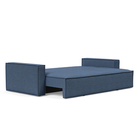 The Newilla Sleeper Sofa from Innovation Living with standard arms and weda blue 302 upholstery setup as a bed.