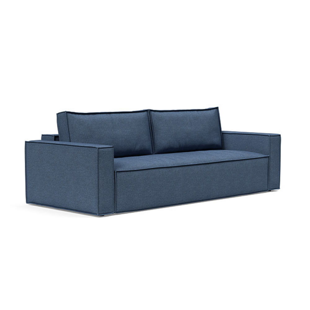 The Newilla Sleeper Sofa from Innovation Living with standard arms and weda blue 302 upholstery setup as a sofa.