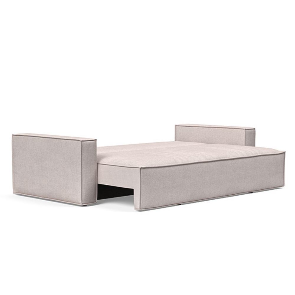 The Newilla Sleeper Sofa from Innovation Living with standard arms and weda sand 300 upholstery setup as a bed.