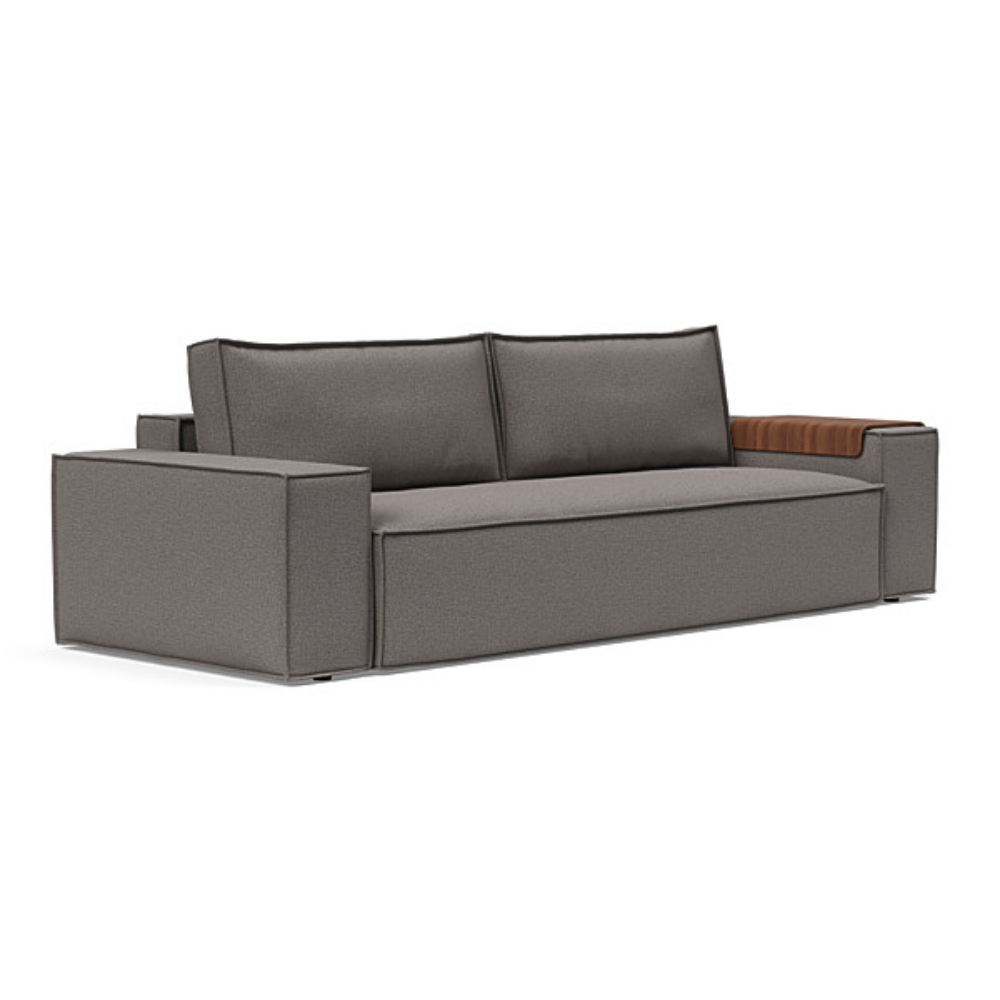 The Newilla Sleeper Sofa from Innovation Living with wide arms and mixed dance grey 521 upholstery setup as a sofa.