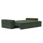 The Newilla Sleeper Sofa from Innovation Living with wide arms and avella pine green 281 upholstery setup as a bed.
