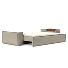 The Newilla Sleeper Sofa from Innovation Living with wide arms and boucle beige 539 upholstery setup as a bed.