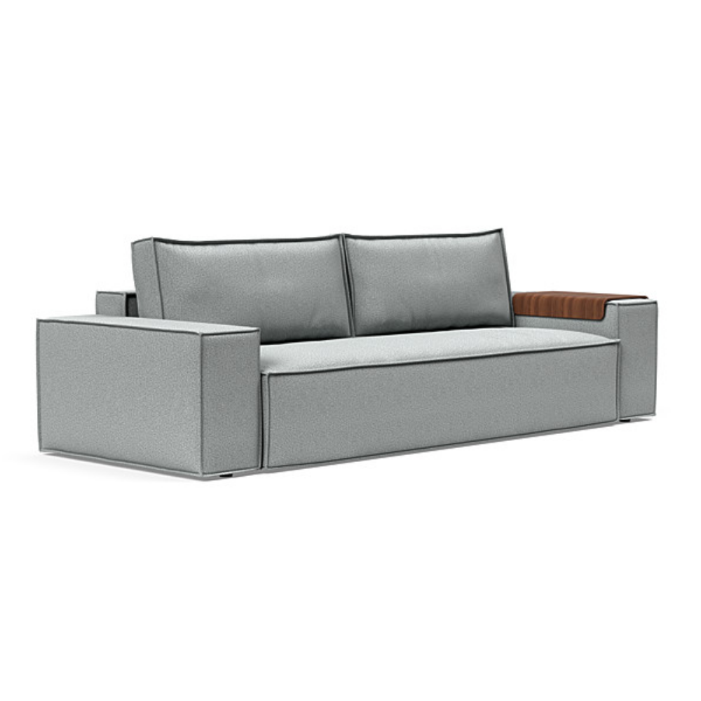 The Newilla Sleeper Sofa from Innovation Living with wide arms and melange light grey 538 upholstery setup as a sofa.