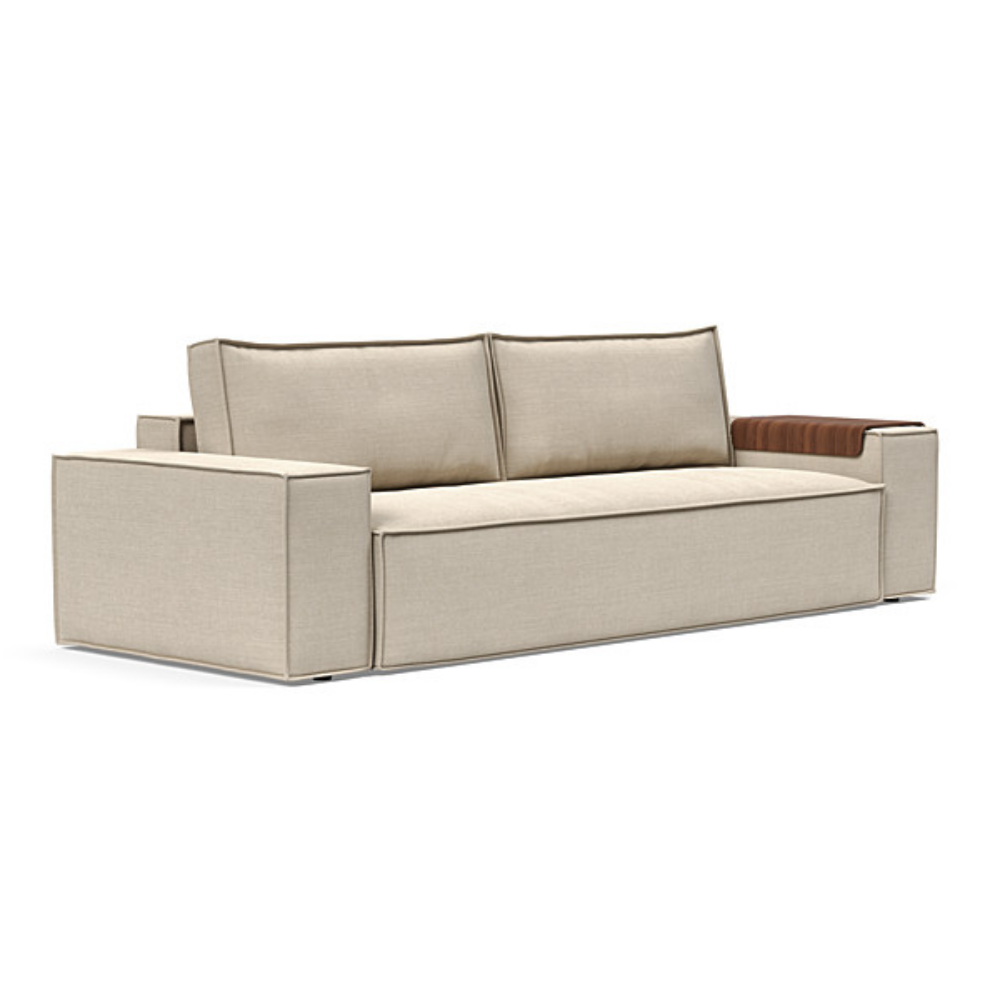 The Newilla Sleeper Sofa from Innovation Living with wide arms and phobos latte 586 upholstery setup as a sofa.