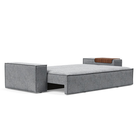 The Newilla Sleeper Sofa from Innovation Living with wide arms and twist granite 565 upholstery setup as a bed.