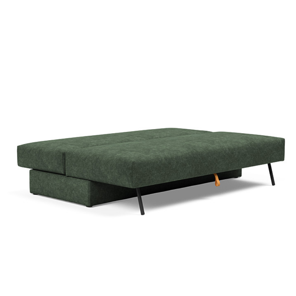 The Osvald Sofa Bed from Innovation Living with avella pine green 281 upholstery setup as a bed.