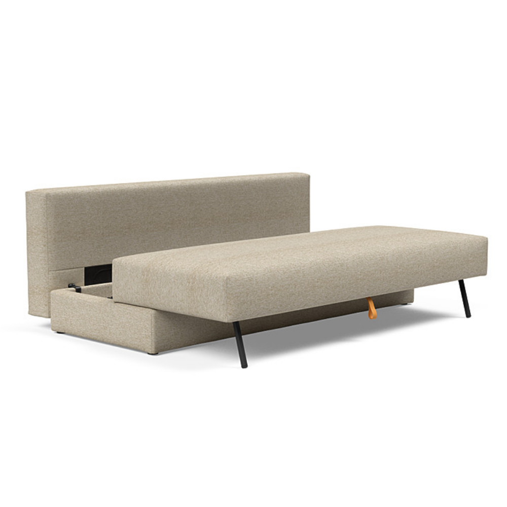 The Osvald Sofa Bed from Innovation Living with halifax antique 366 upholstery showing the internal storage space of the couch.