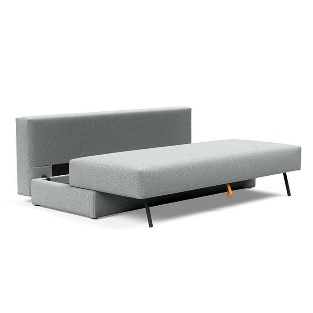 The Osvald Sofa Bed from Innovation Living with melange light grey 538 upholstery showing the internal storage space of the pull out couch.
