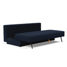 The Osvald Sofa Bed from Innovation Living with mixed dance blue 528 upholstery showcasing the storage spaec of the unit.