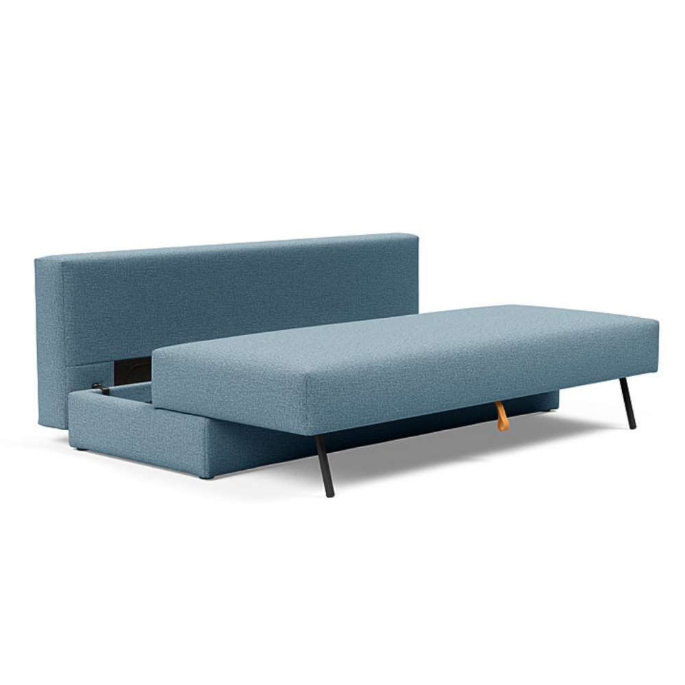 The Osvald Sofa Bed from Innovation Living with mixed dance light blue 525 upholstery showing the storage.