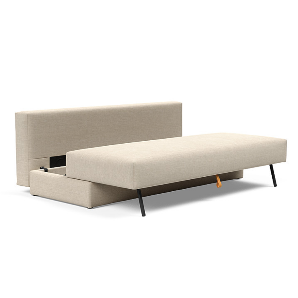The Osvald Sofa Bed from Innovation Living with phobos latte 586 upholstery showing the storage aspect.