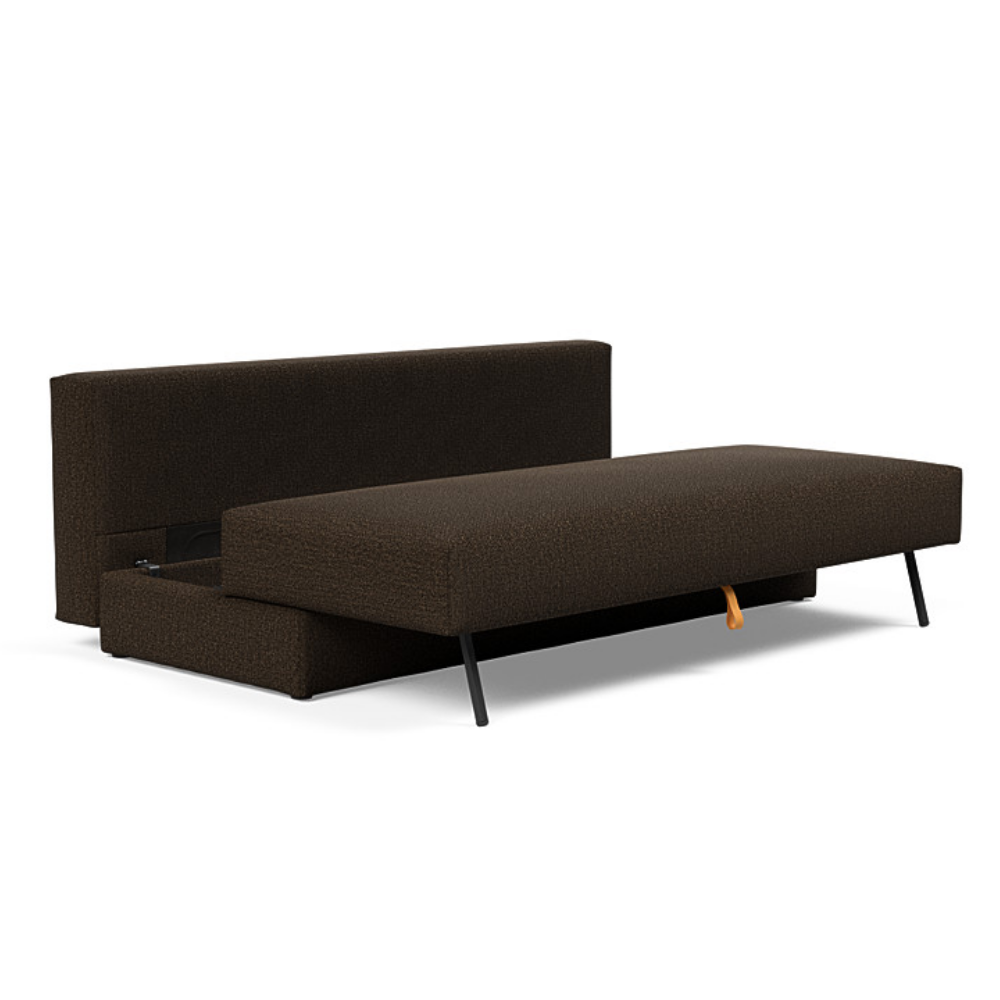 The Osvald Sofa Bed from Innovation Living with taura chocco 358 upholstery showing the internal storage space of the pull out couch.