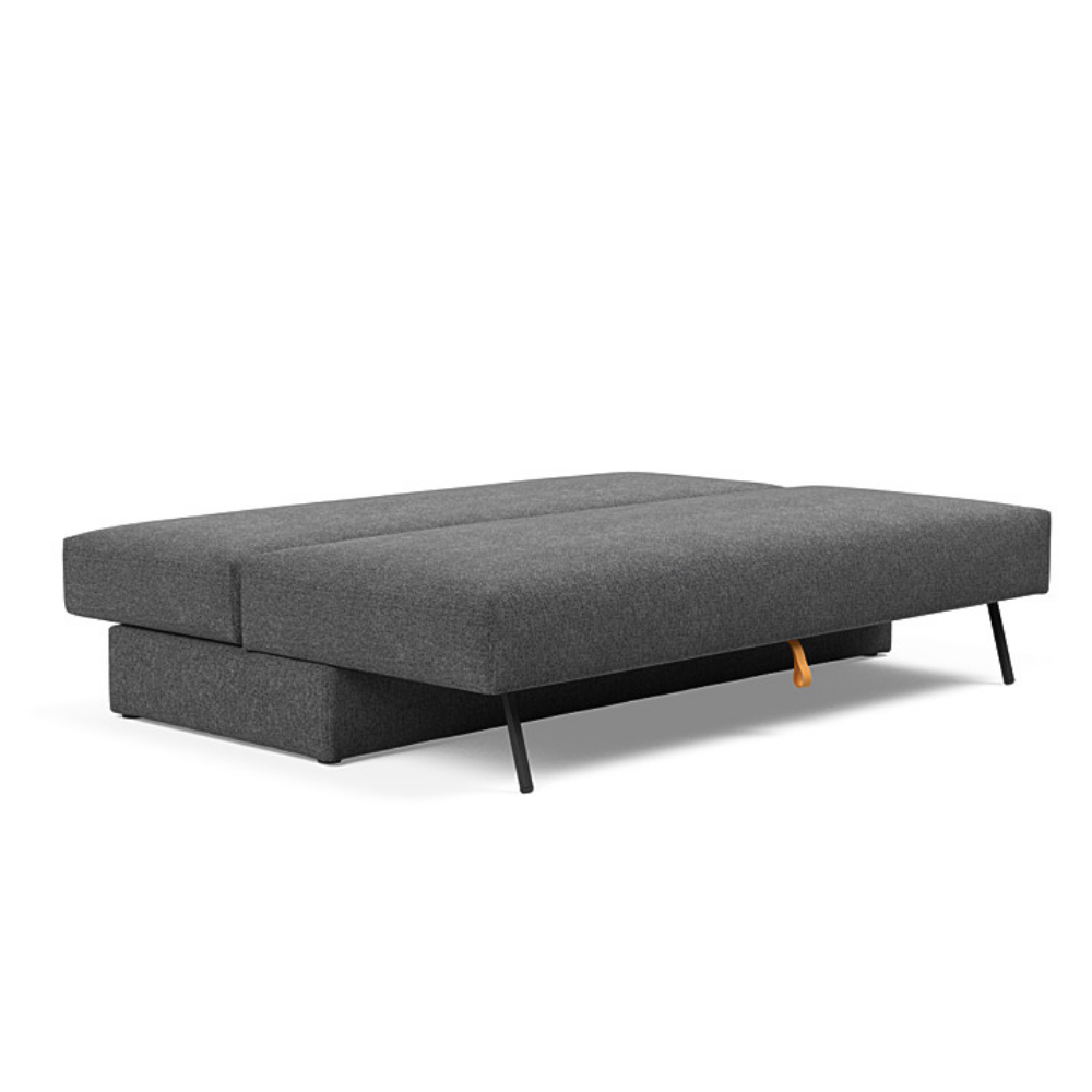 The Osvald Sofa Bed from Innovation Living with taura deep grey 350 upholstery setup as a bed.