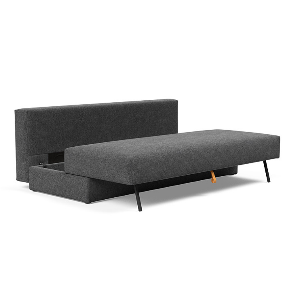 The Osvald Sofa Bed from Innovation Living with taura deep grey 350 upholstery showing the internal storage.
